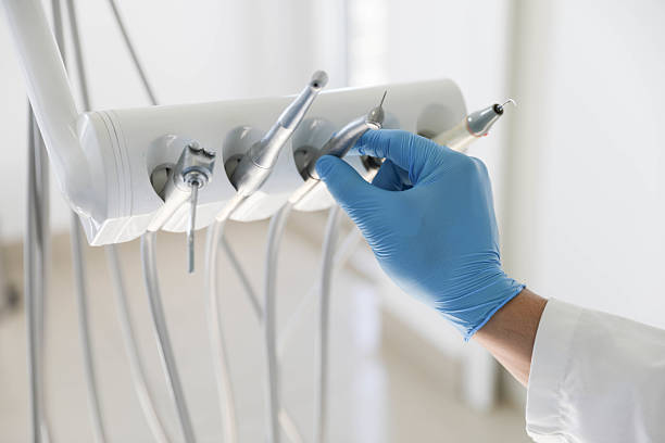 Professional Tooth Extraction technician working in St. Clair County County, AL